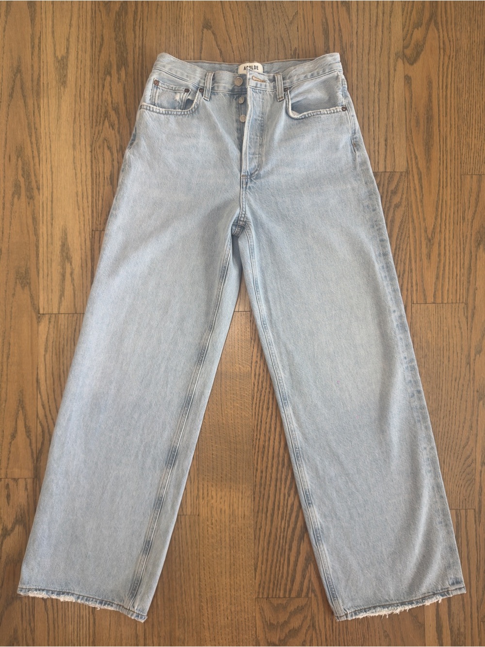 AGOLDE light wash denim wide-leg jeans with a button fly - 24